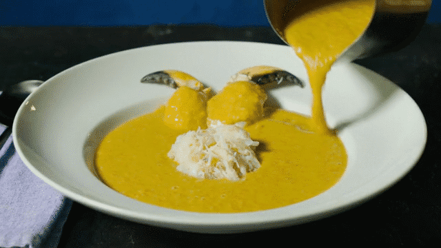 Crab Bisque plated in a large bowl.